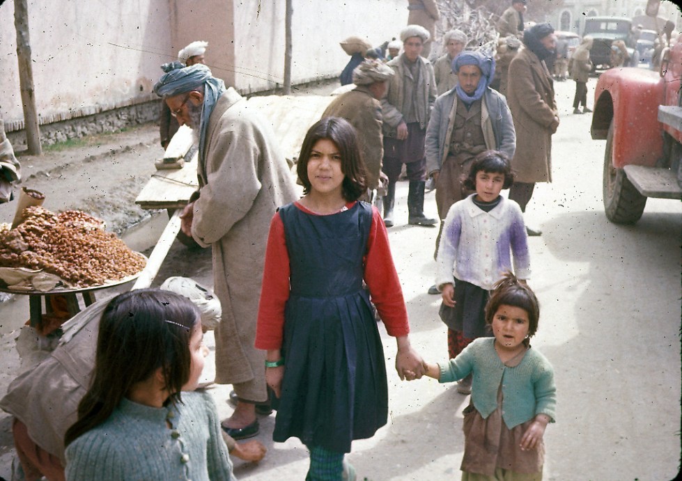 "Sisters pose for a photograph in Kabul."